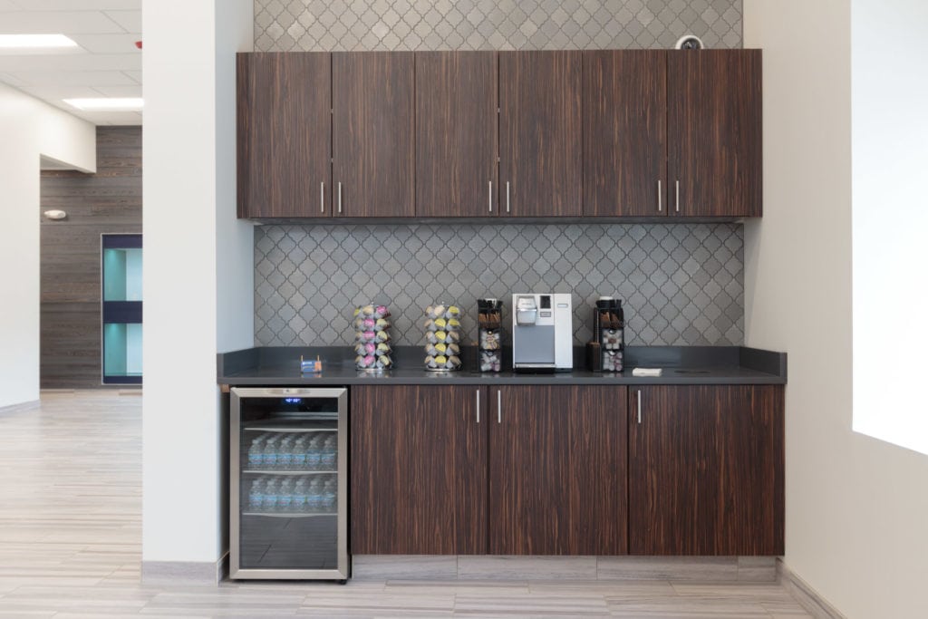 lobby area with fridge and coffee machine